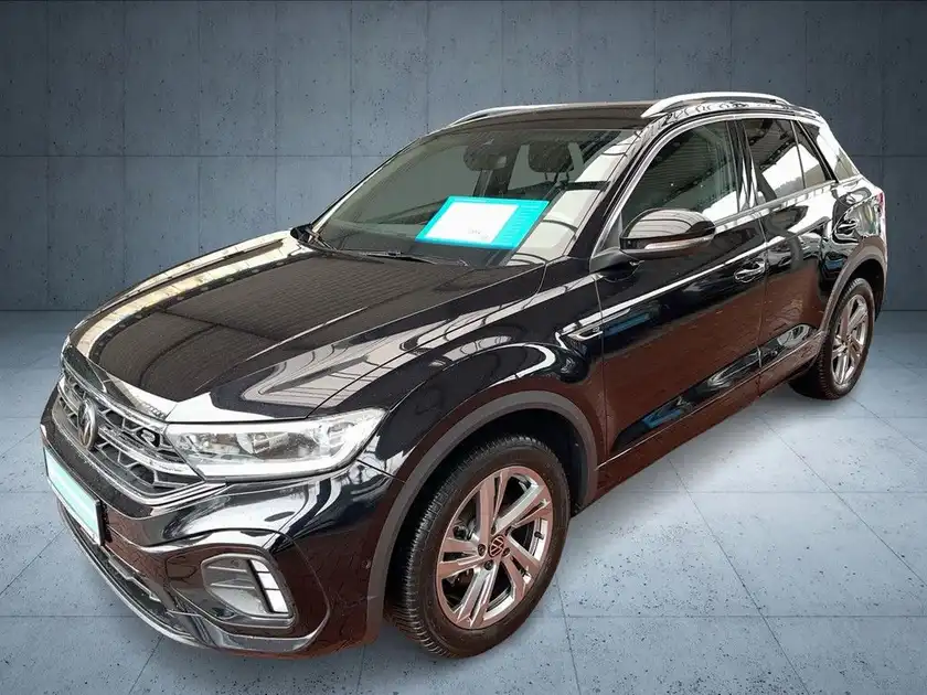 Das Bild zeigt einen schwarzen VW T-ROC aus der Seitenansicht. Das Fahrzeug steht auf einem gleichmäßigen Hintergrund und trägt das Händlerlogo von Walter Schneider sowie eine markante Texteinblendung.