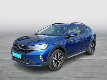 Das Bild zeigt einen blauen VW Taigo von der Seite. Das Händlermarke "Walter Schneider" ist im Bild eingeblendet.