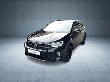 Ein Bild eines schwarzen VW TAIGO aus der Frontalansicht, mit dem Händlerlogo "WALTER SCHNEIDER" und dem Text "Zertifizierte Gebrauchtwagen".