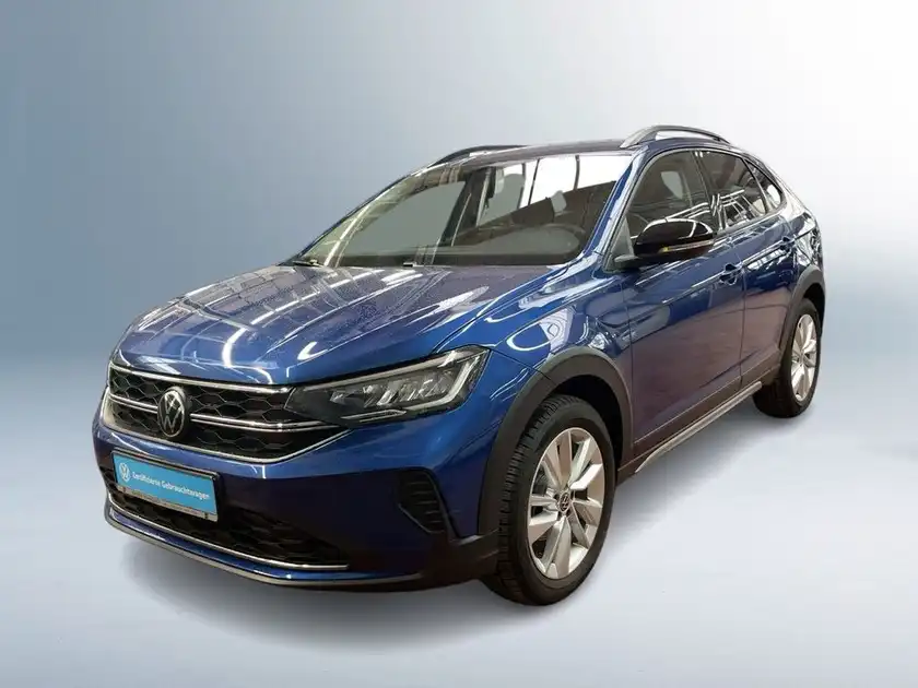 Das Bild zeigt einen blauen VW Taigo aus der Frontalansicht. Auf dem Foto ist das Händlerlogo von Walter Schneider zu sehen.