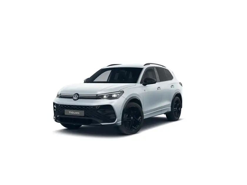 Das Bild zeigt einen weißen Volkswagen Tiguan aus der Frontalansicht.