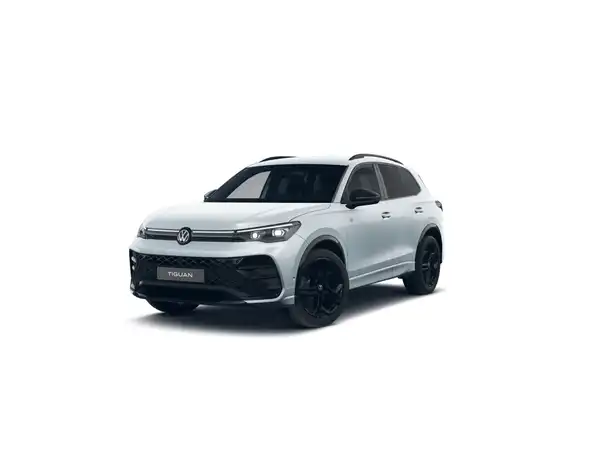 Das Bild zeigt einen weißen Volkswagen Tiguan aus der Frontalansicht.